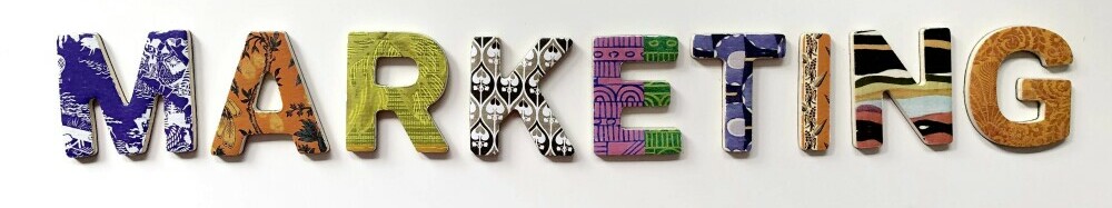 colourful magnets that spell out marketing