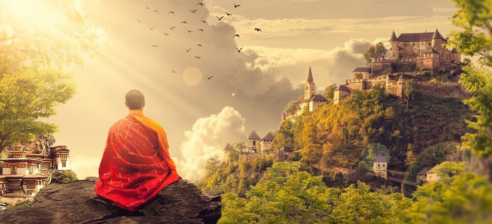 a man on a mountain overlooking a magical sight to emulate beliefs