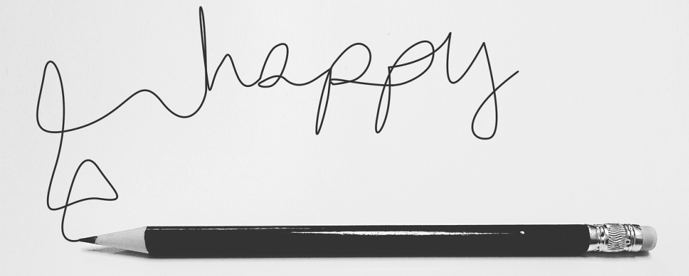 a pencil that has written the word