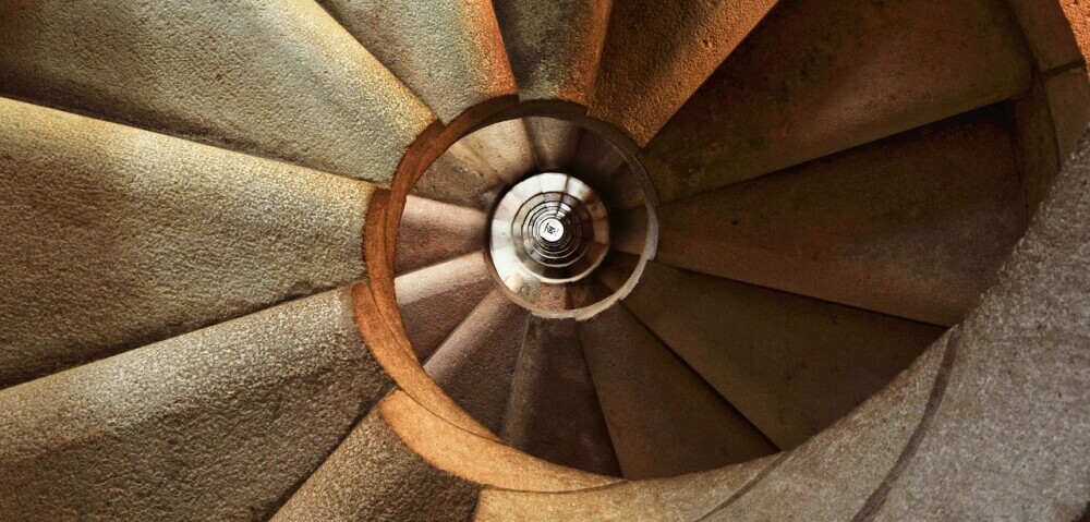 a winding staircase of steps to success
